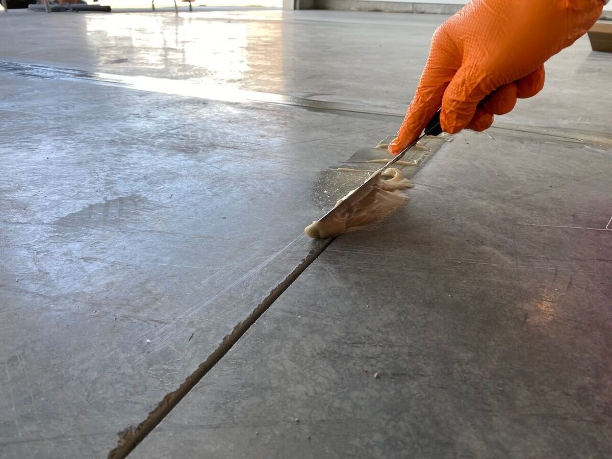 Concrete joint repair before floor coating