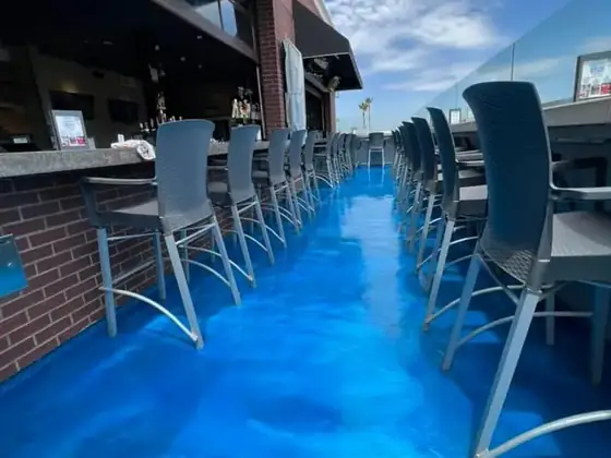 Blue metallic commercial patio coating by Epoxy Pros