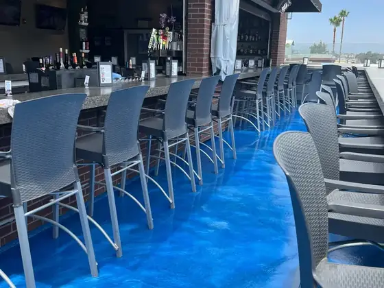 Blue metallic exterior walkway coating by Epoxy Pros