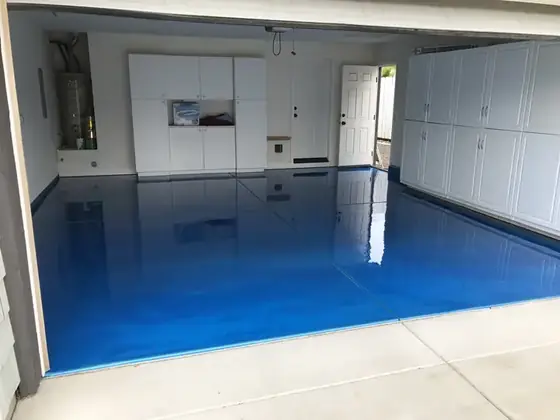 Blue metallic epoxy garage floor by Epoxy Pros