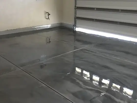 High-gloss charcoal metallic garage floor by Epoxy Pros